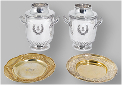 A pair of French silver wine-coolers and English silver-gilt dishes