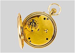 A gold Karussel lever watch