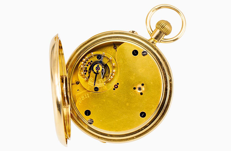 A gold Karussel lever watch