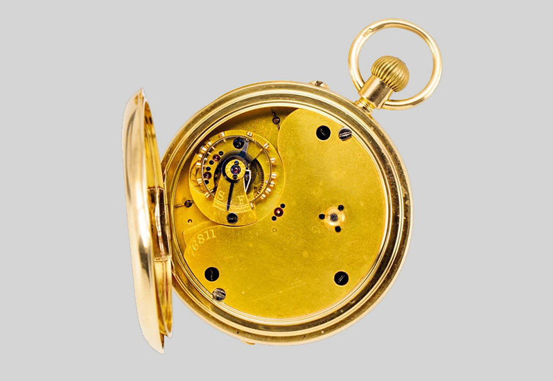 A gold Karussel lever watch